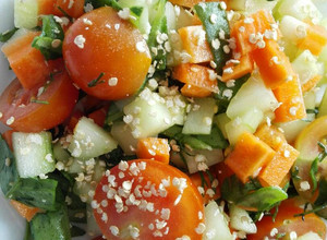 Una foto de Ensalada con vinagreta cítrica y quinoa