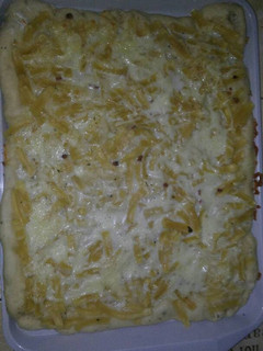Una foto de Pizza carbonara