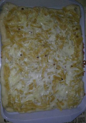 Una foto de Pizza carbonara