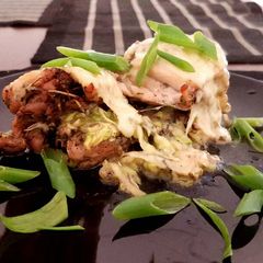 A picture of Zucchini and Blue Cheese Stuffed Chicken Provençal.