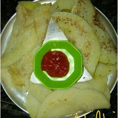 A picture of Suji chila stuff with potato vegetable.