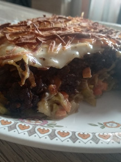 Una foto de Lasaña de morcilla y verduras