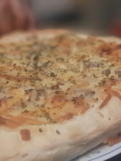 Una foto de Pizza napolitana