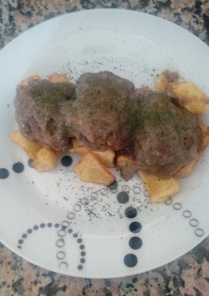 Una foto de Filetes rusos en salsa española