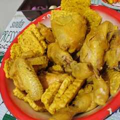 A picture of Ayam tempe ungkep bumbu kuning.