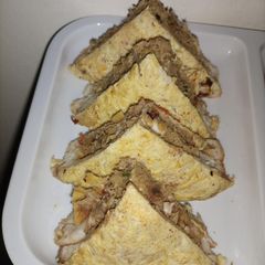A picture of Egg Wrapped Shami Sandwich.