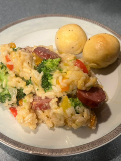 A picture of One pot sausage, veggies and rice.