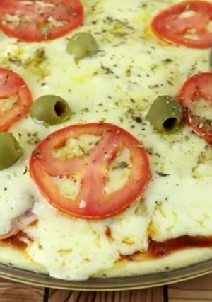 Una foto de Pizza casera en horno de microondas