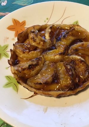 Une photo de Tartelettes fines clémentines et prunes (pâte brisée vanille)