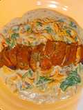 Creamy mushroom carrot pasta with bacon-wrapped chicken breast