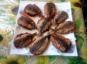 Une photo de sardine tomate