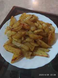 Una foto de Patatas al horno hiper ricas!!!