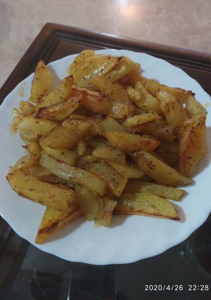 Una foto de Patatas al horno hiper ricas!!!