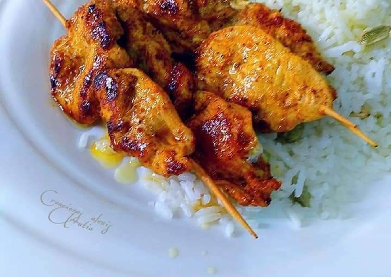 Pechuga de pollo tandoori con arroz blanco aromatizado