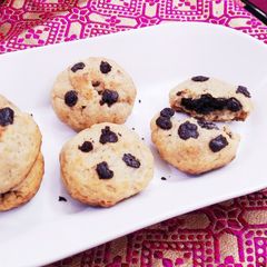 A picture of Dark chocolate ganache filled choco chip cookies.