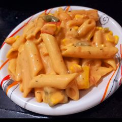 Penne pasta with cheese A picture of Penne pasta with cheese.