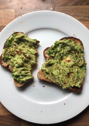 A picture of Breakfast Chilli, Avocado, Marmite on Toast.