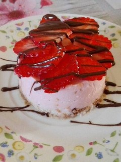 Una foto de Mouse de fresas con queso fresco