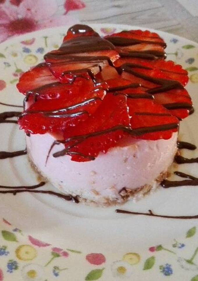 Una foto de Mouse de fresas con queso fresco