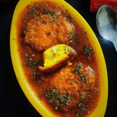A picture of Eggs Pakoda in Gravy.