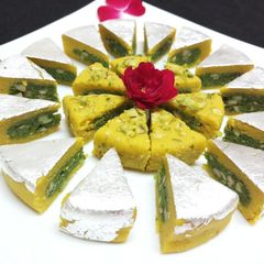 A picture of Peanut Kesar Pista Triangles.