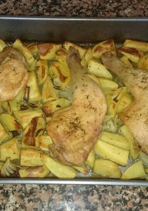 Una foto de Muslos de pollo al horno