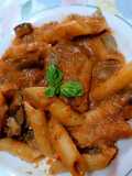 Pennoni rigati con crema di melanzane e pomodori secchi