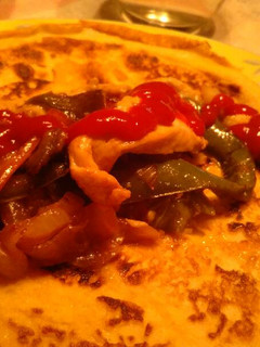 Una foto de Fajitas de pollo y verduras