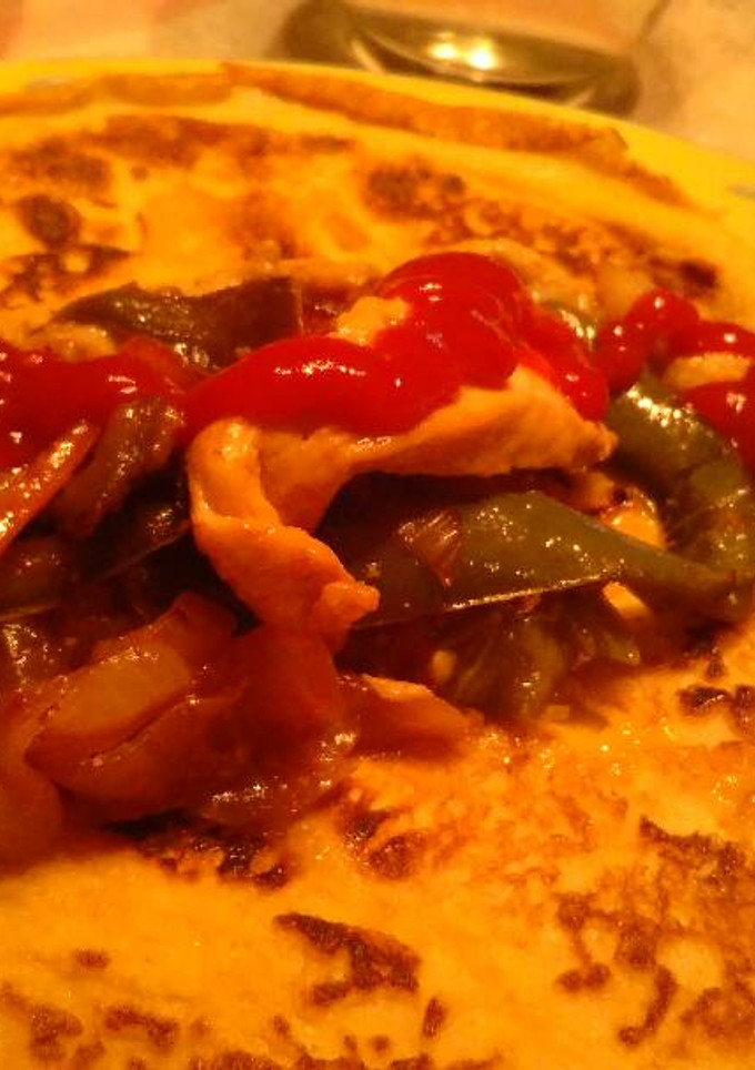 Una foto de Fajitas de pollo y verduras