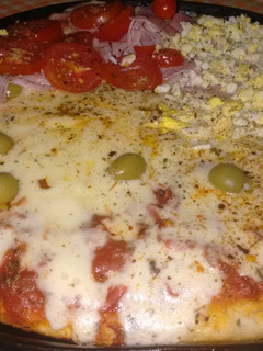 Una foto de Pizza tipo porteña