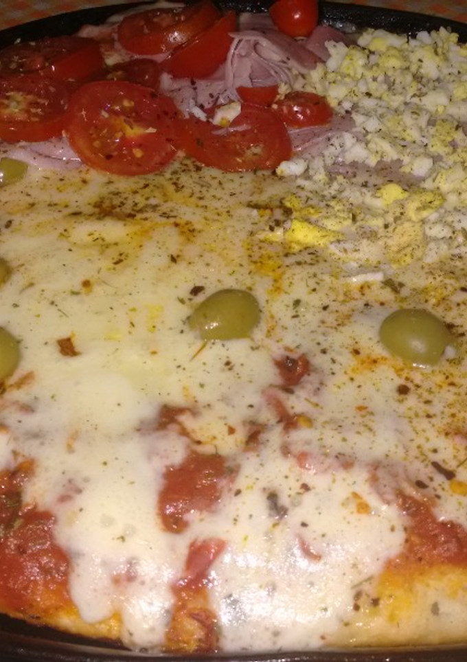 Una foto de Pizza tipo porteña
