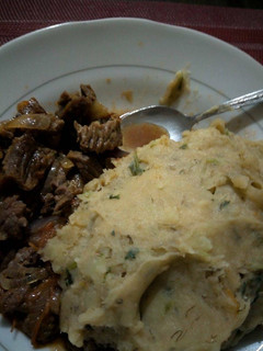A picture of Mashed matoke served wid beef stew.