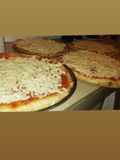 Una foto de Pizzas