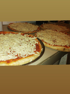 Una foto de Pizzas