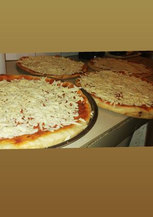 Una foto de Pizzas