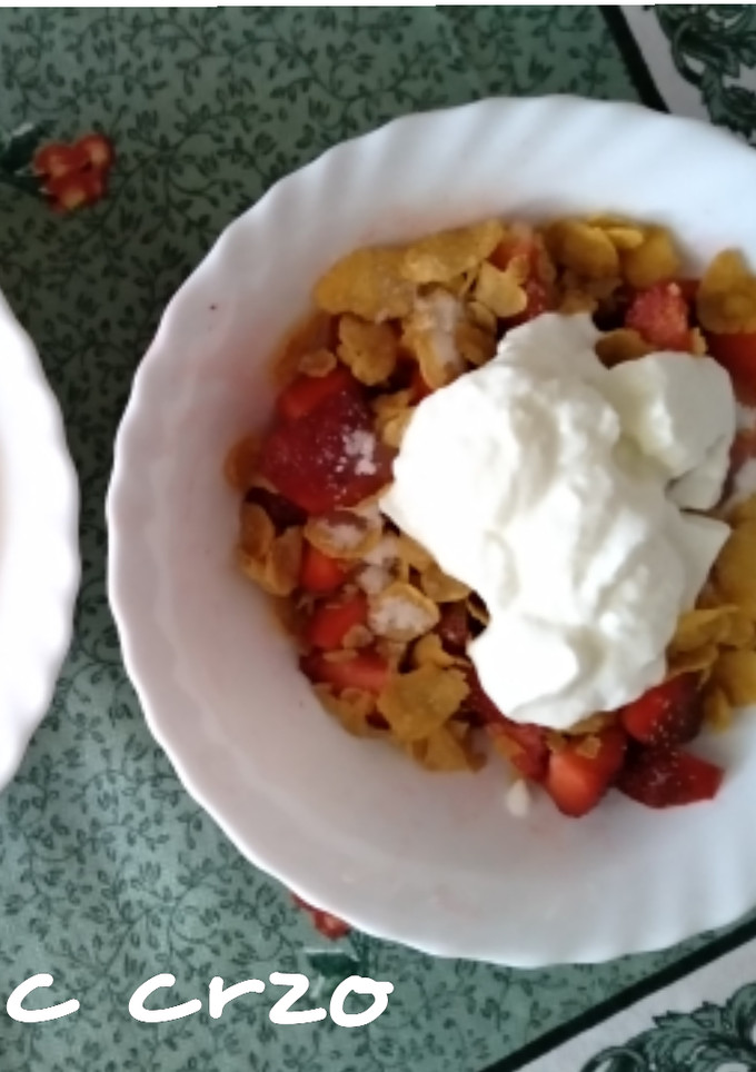 Una foto de Fresas con copos de maíz