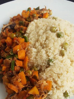A picture of Couscous and fish sauce.