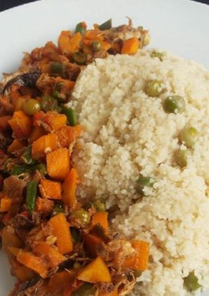 A picture of Couscous and fish sauce.