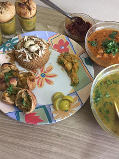 A picture of Dal bati with gatte ki sabzi, churma, lasan ki chutney aur dal.