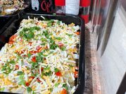 A picture of sour cream and cheese enchiladas