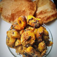 A picture of Aloo Posto.