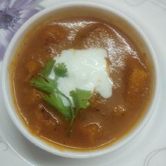 A picture of Tomato carrot soup.
