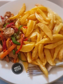 A picture of Chips with chicken veggies.