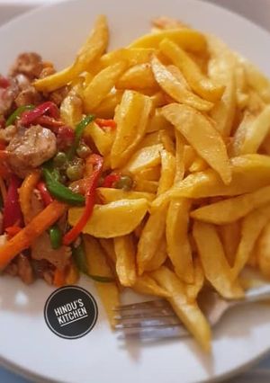 A picture of Chips with chicken veggies.