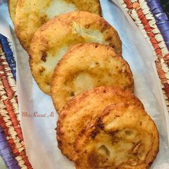 A picture of Semolina pancakes| Punjabi Poora| Malpura.