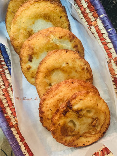 A picture of Semolina pancakes| Punjabi Poora| Malpura.