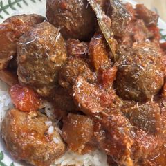 A picture of Cheesy Meatballs in Tomato Sauce.