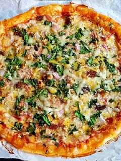 Una foto de Pizza hojaldrada de Espinacas y Nueces
