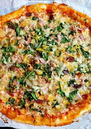 Una foto de Pizza hojaldrada de Espinacas y Nueces