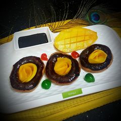 A picture of #Choco Mango doughnuts.